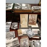A collection of late 19th, early 20th century photographs to include two family albums