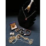 A large collection of miscellaneous costume jewellery to include bracelets, earring, necklaces etc