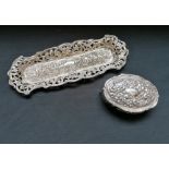A Birmingham silver trinket box dated 1906 by B.C having foliage design to hinged lid containing a