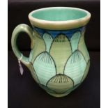 A Charlotte Rhead Crown Ducal Art Deco green glazed jug. 25.5cm in height.