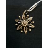 Victorian 9ct Hexagon starburst styled seed pearl brooch circa 1890.