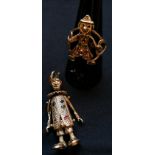 A yellow metal clown pendant and ring. Hallmarks rubbed, probably 9ct. 15g approximately.