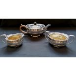 Three piece silver ovoid half lobed tea set with gadroon decoration. London 1919, makers Daniel &