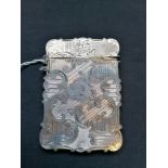 Fine silver visiting card case, cased and scrolled with floral and foliate decoration. Famous