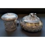 Two late 19th century Indian white metal pots with covers (a.f).