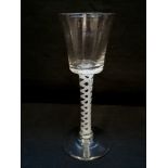 A late 18th century opaque twist wine glass. 15.5 cm in height.