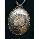 A 1966 gold Sovereign Elizabeth II in a 9ct gold mount. 19g approximately including pendant.