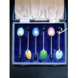 Cased set of silver and enamel coffee bean coffee spoons. Maker Henry Clifford Davis. Birmingham,