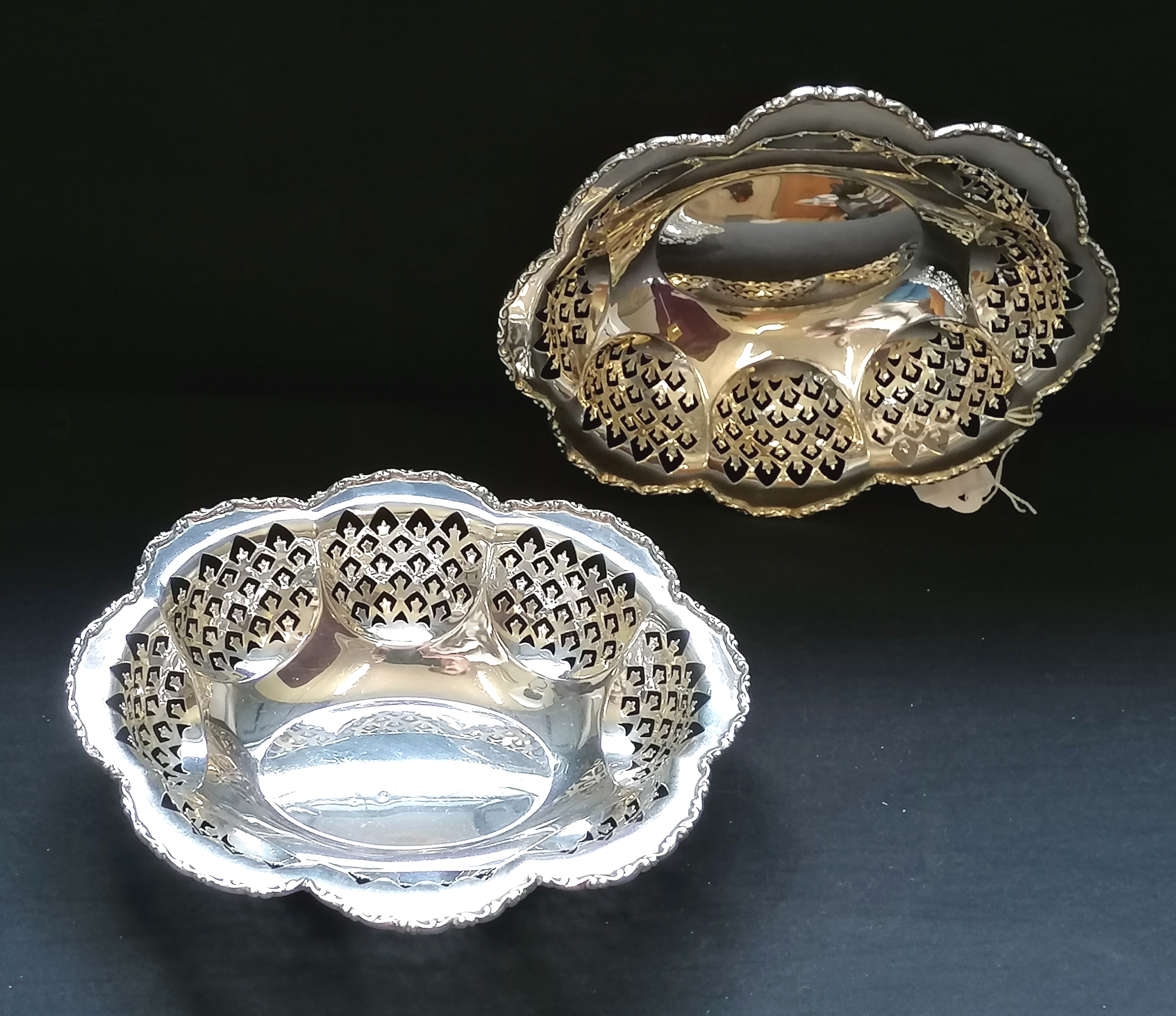 A pair of pieced silver bowls, Birmingham 1936 makers marks partially rubbed. 21cm in width by 5.5cm