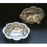 A pair of pieced silver bowls, Birmingham 1936 makers marks partially rubbed. 21cm in width by 5.5cm