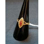 15ct .625 Victorian Marquise set ruby and pearl ring. Chester, 1896. Ring size P.