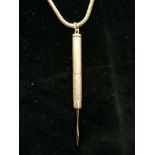 9ct gold chain with 9ct gold propelling toothpick pendant. 19g approximately.