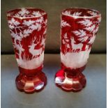 Fabulous pair of south German |Bohemian| ruby glass vases with finely etched wildlife scenes circa