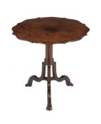 † A mahogany and fustic tripod table