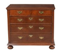 An oak chest of drawers