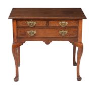 A George III oak, chestnut and elm side table