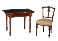 A Victorian mahogany and leather inset writing table