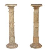A pair of Italian alabaster pedestals