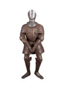 A Victorian steel full suit of armour in style