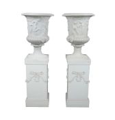 A pair of substantial white painted stone composition models of the Borghese vase