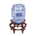 A Minton's blue and white printed pottery garden seat in the Chinese manner