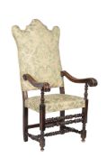 † A Continental walnut armchair