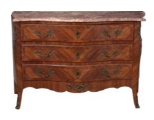 ϒ A kingwood commode in Louis XV style