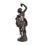 After François Théodore Devaulx, (French 1808 - 1870), a patinated bronze model of a dancing Bacchan