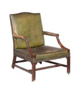 † A mahogany and leather upholstered mahogany armchair in George III style