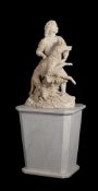 A sculpted and painted composition pastoral figural group of a shepherd boy and hound