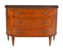 An Edwardian satinwood and marquetry chest of drawers