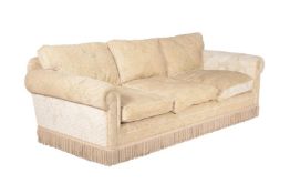 An upholstered sofa three seat sofa