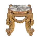 A carved giltwood and marble inset urn stand