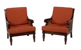 A pair of mahogany bergère armchairs