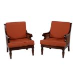 A pair of mahogany bergère armchairs