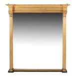 A giltwood overmantel mirror