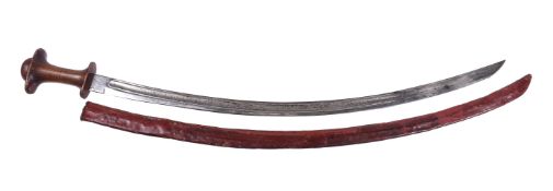 ϒ An Ethiopian Menelik II King's Guard sword with rhinoceros horn hilt and later carved wood pommel