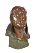 λ Sylvain Norga, (Belgian 1892 - 1968), a bi-colour patinated bronze bust of an airman,