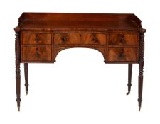 A Regency mahogany and brass inlaid dressing table