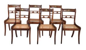 ϒ A set of six Regency rosewood and gilt metal mounted dining chairs