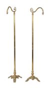 A pair of gilt brass standard lamps