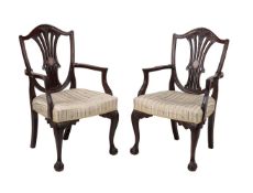 A pair of mahogany armchairs in George III style