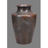 A Japanese Bronze Vase of tapered form with an angular shoulder and cylindrical neck with everted