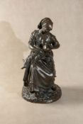 After Aimé-Jules Dalou (French 1838 - 1902), a patinated bronze group of a nursing mother and infant