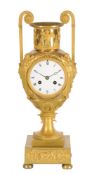 A French Empire ormolu 'amphora' mantel clock