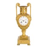 A French Empire ormolu 'amphora' mantel clock