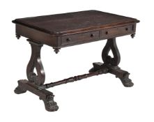 ϒ A William IV mahogany and rosewood writing table