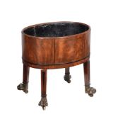 ϒ A Regency mahogany and ebony inlaid wine cooler