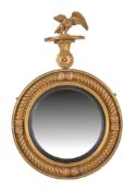 A Regency giltwood convex wall mirror