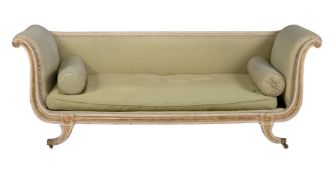 A Regency cream painted and parcel gilt sofa